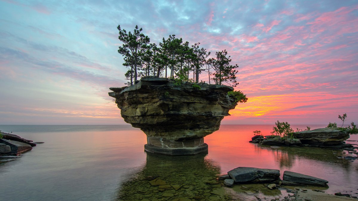 美国海岸奇怪石头日落风景图片