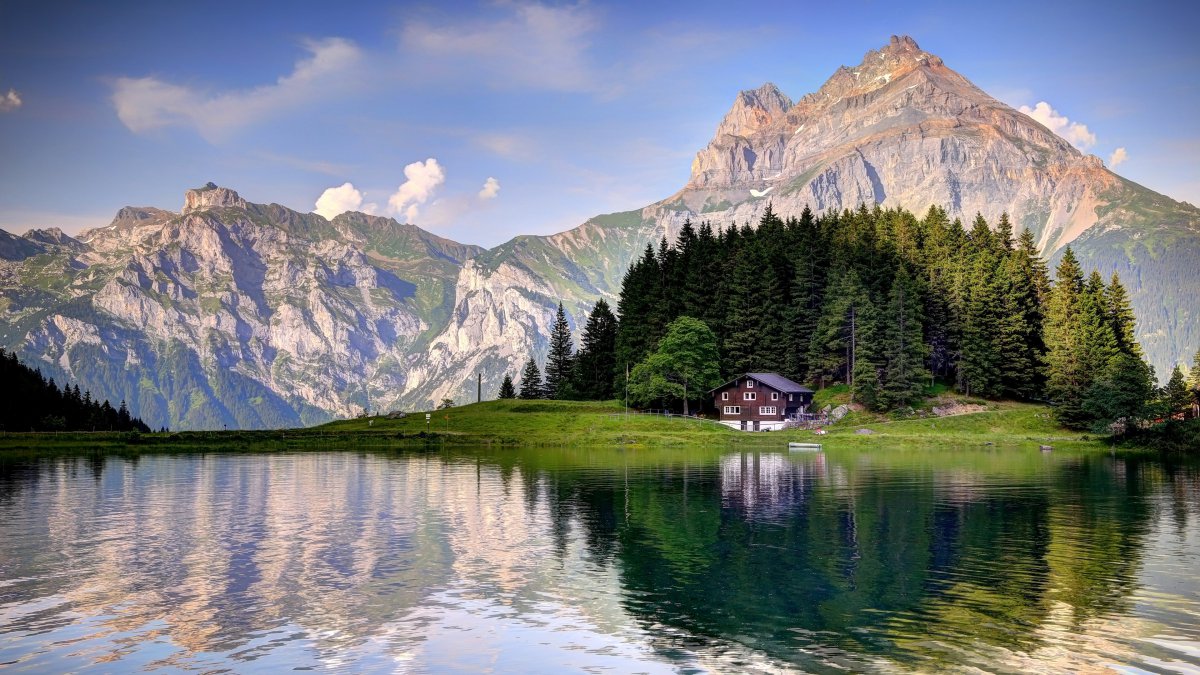瑞士阿尔卑斯山湖房子2022风景高清摄影图片
