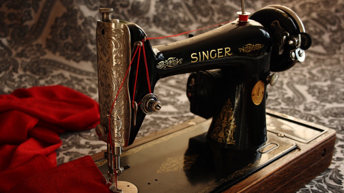 古董缝纫机一百万赝牌图片