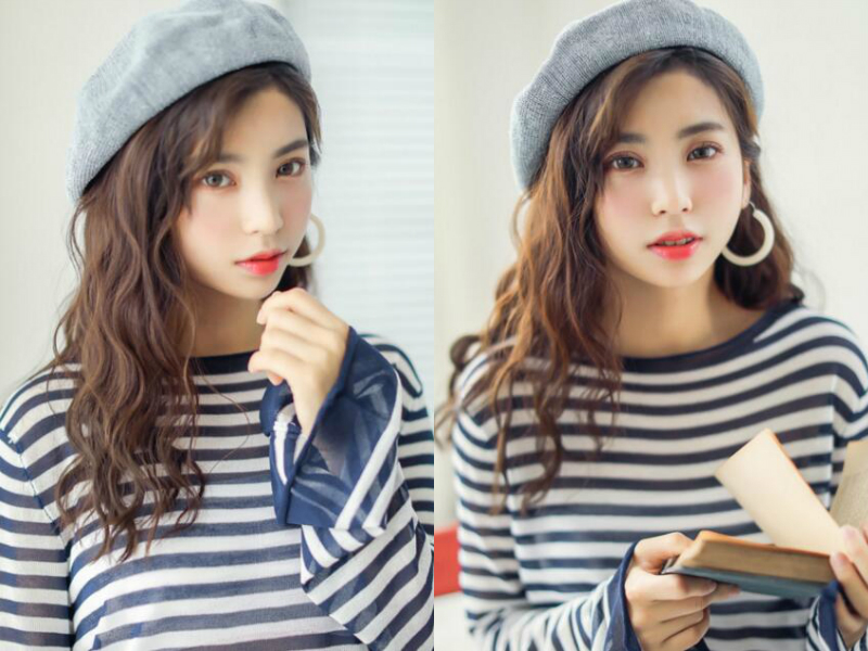 蛋卷头发型,轻薄的空气刘海看起来透气十足,一头中长发自然的披散在