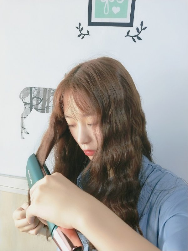 手残党福音|美丽仕卷发棒女
