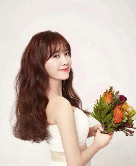 提高女生甜美度的蛋卷头发型女神风采的卷烫头发造型设计