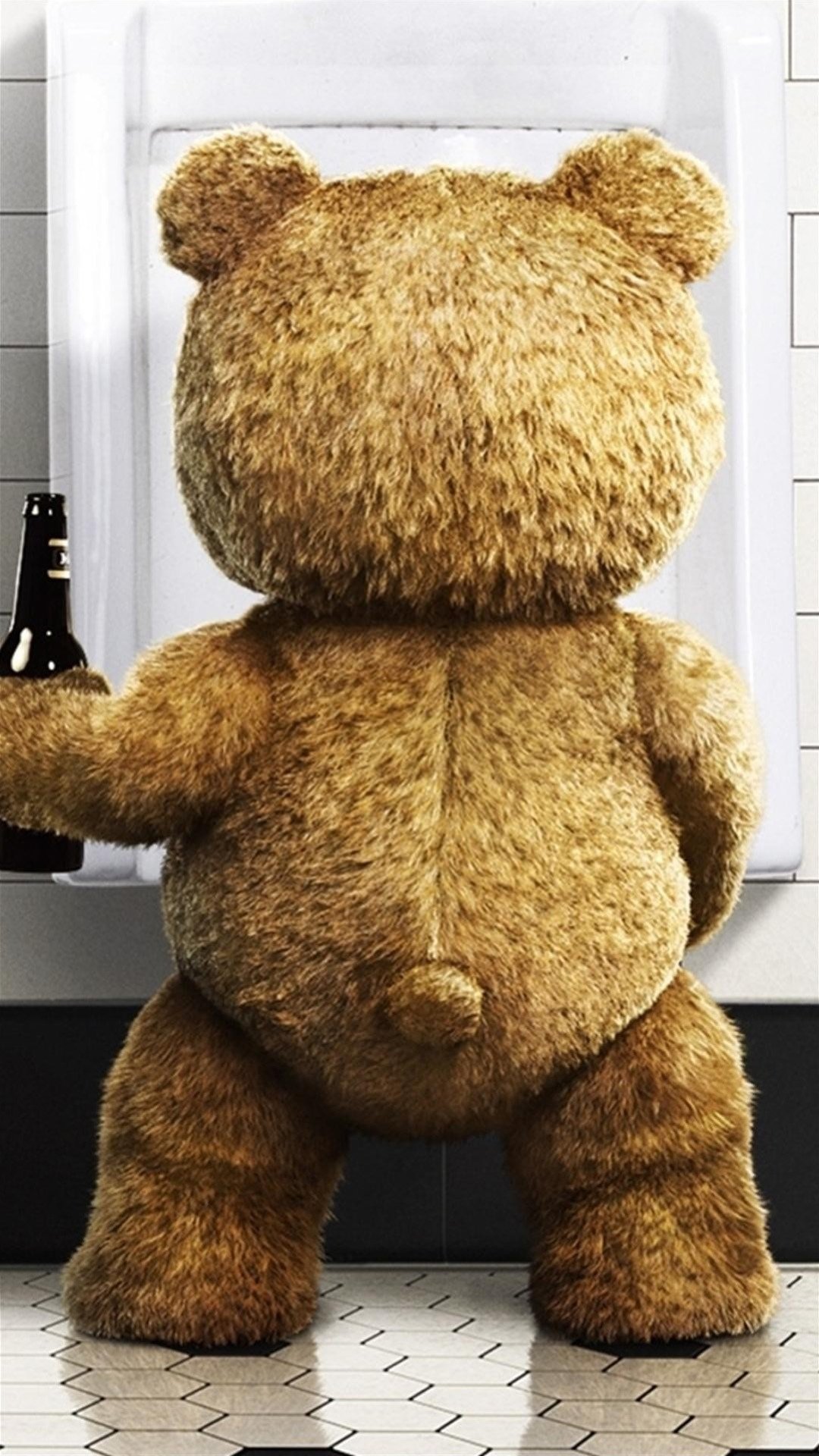 泰迪熊拿酒瓶图片图片