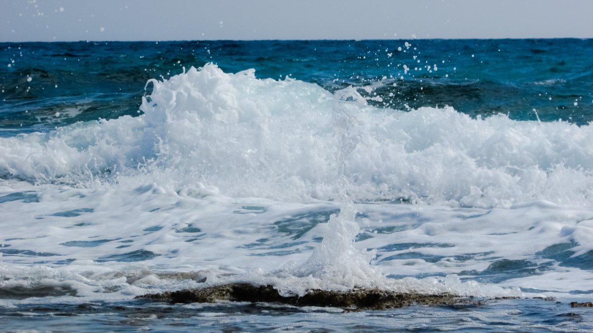 海水翻滾浪花圖片,高清圖片