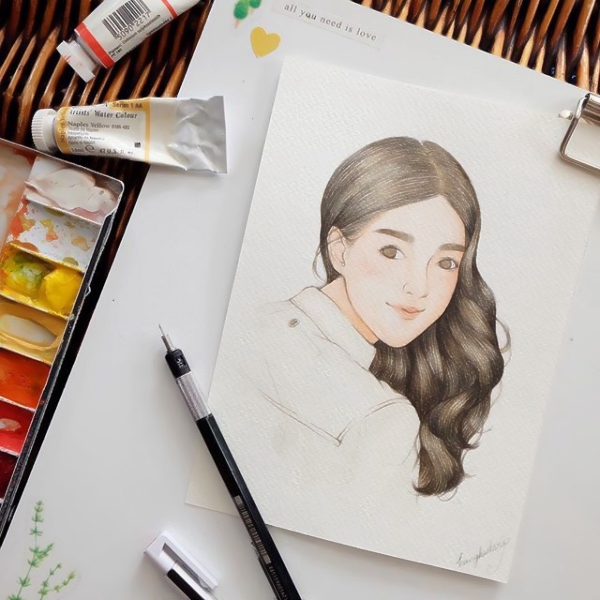 纸上的手绘女生头像