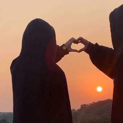 高清唯美的情侣头像真人背景是落日图片